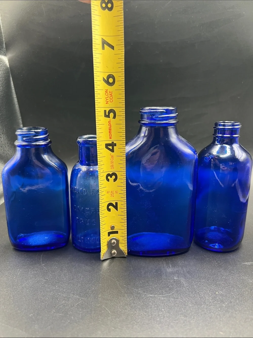Lot of 4 vintage Colbalt Blue Glass Bottles